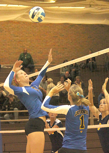 Audrey Skrabis (5) and Julie Larson (1) caused problems for Grand Rapids CC on Thursday night at MCC.