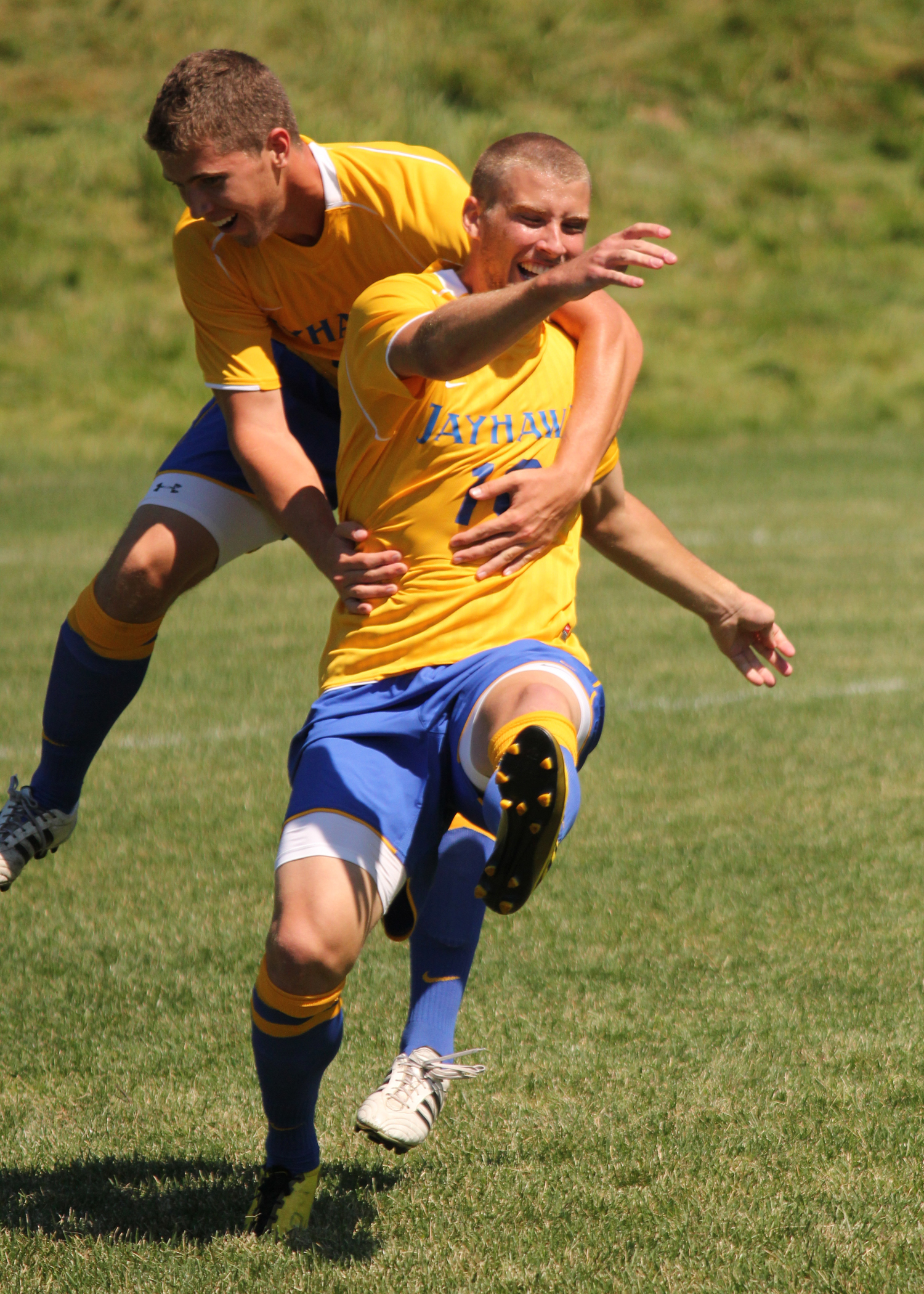 Nathan Schmitt celebrates after scoring the first goal in MCC history.