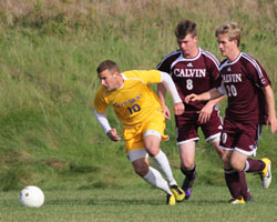 Nathan Schmitt races past Calvin defenders for his first goal on Wednesday.