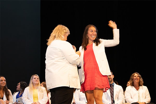 Nurse receives graduation and completion