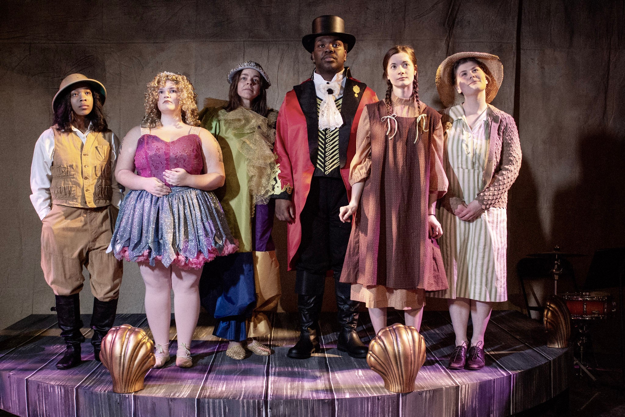 A troupe of circus performers and townspeople from the play Elephant's Graveyard.