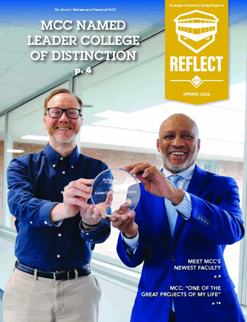 President John Selmon and Provost Tucker Brown both hold Acheving the Dream award Tucker Brown hold an award together and smile for the camera.